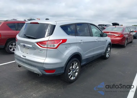 2013 Ford Escape Sel z USA, uszkodzony, nr VIN 1FMCU0HXXDUB51540
